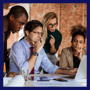 Industrial security team reviewing RMF documentation to align system reality with compliance requirements.